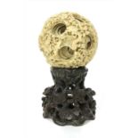 A Chinese ivory puzzle ball,