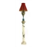 An onyx table lamp on pedestal,