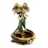 An early 20th century Continental pottery centrepiece,