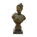 An Art Nouveau earthenware bust of a lady,