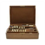 A Walker & Hall oak cased part canteen of silver plated cutlery