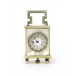 A French mother-of-pearl miniature clock,