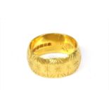 A 22ct gold wedding ring,