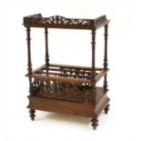 A Victorian figured walnut canterbury whatnot,