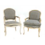 A pair of lined wood fauteuils,