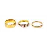 Two 22ct gold wedding rings,