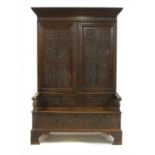 An oak settle,