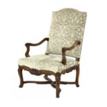 A Continental walnut open armchair,