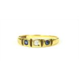 A gold sapphire and diamond ring