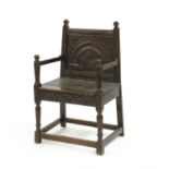 Early 19th century carved oak hall chair
