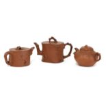 A collection of three Chinese Yixing zisha teapots,