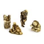 A collection of four Japanese ivory netsuke,