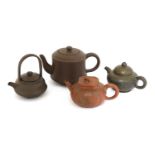 A collection of four Chinese Yixing zisha teapots,