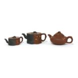 A collection of three Yixing Zisha teapots,