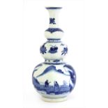 A Chinese blue and white triple gourd vase,