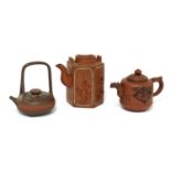 A collection of three Chinese Yixing zisha teapots,