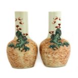 A pair of Chinese famille rose bottle vases,