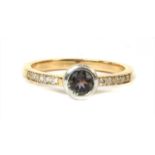 An 18ct gold colour change sapphire and diamond ring,