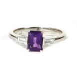 A white gold amethyst and diamond three stone ring