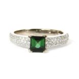 An 18ct white gold green tourmaline and diamond ring