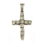 An 18ct white gold diamond set Latin cross