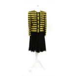 Theatre interest, A Pierre Balmain black and gold 'Bee' jacket and skirt suit,