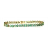A 9ct gold emerald and diamond bracelet,