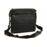 A Gucci cross body Messenger bag,