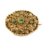 A gold emerald oval cannetille brooch,