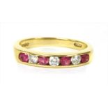 An 18ct gold diamond and pink sapphire half eternity ring,