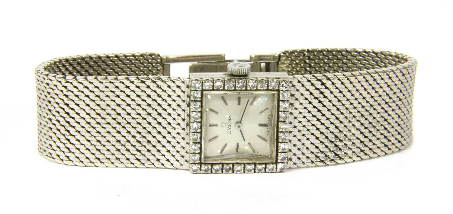 A ladies' 18ct white gold diamond set Omega mechanical bracelet watch, c.1960