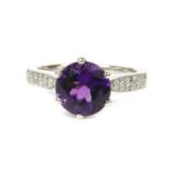 An 18ct white gold amethyst and diamond ring