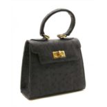 A Pickett of London black ostrich leather mini handbag