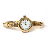 A ladies' 9ct gold mechanical bracelet watch,