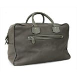A Ghurka grey leather travel bag,