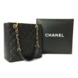 A Chanel black caviar petit tote,