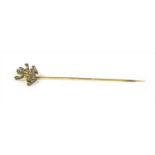 A Continental gold, diamond and emerald set frog stickpin,