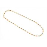 A gold varicoloured sapphire rivière necklace,