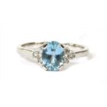 An 18ct white gold aquamarine and diamond ring,