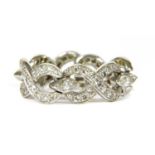 A gold diamond set chain link ring