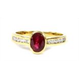 An 18ct gold ruby and diamond ring,
