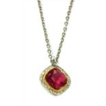 A platinum pink tourmaline and diamond halo cluster pendant