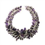 A silver graduated amethyst garland necklace,