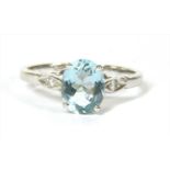 A 9ct white gold aquamarine and diamond ring,