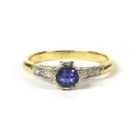 An 18ct gold tanzanite and diamond ring