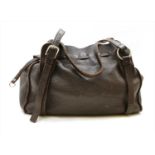 A Miu Miu brown leather hobo bag