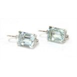 A pair of white gold aquamarine and diamond earrings,