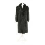 A full length mink fur coat with fox fur collar,