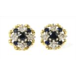 A pair of 18ct gold sapphire and diamond cluster earrings,