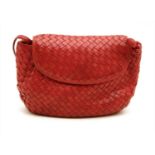 A Bottega Veneta red intrecciato leather shoulder bag